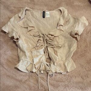 Light Pink Ruffled Lace-Up Blouse